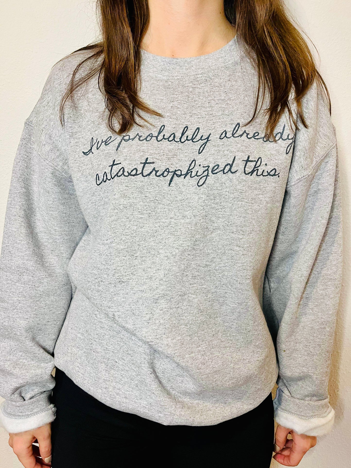 ¡Catástrofe! Sudadera unisex con cuello redondo Heavy Blend™